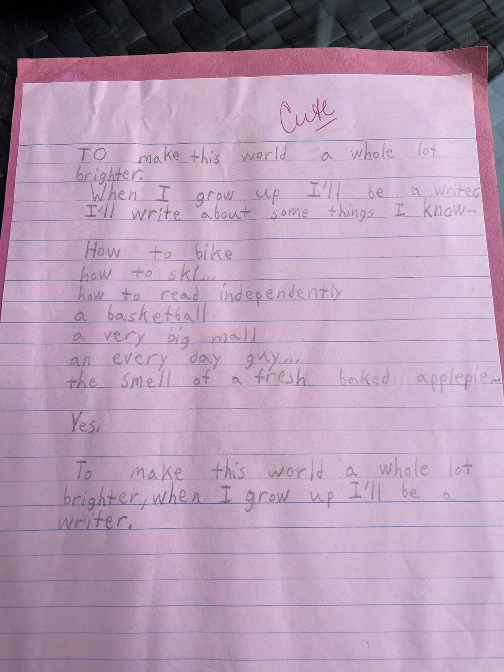 A handwritten letter from kindergarten-aged Maxwell Cohen on pink lined paper, with the word ‘Cute’ annotated in pink ink at the top by his mother.
